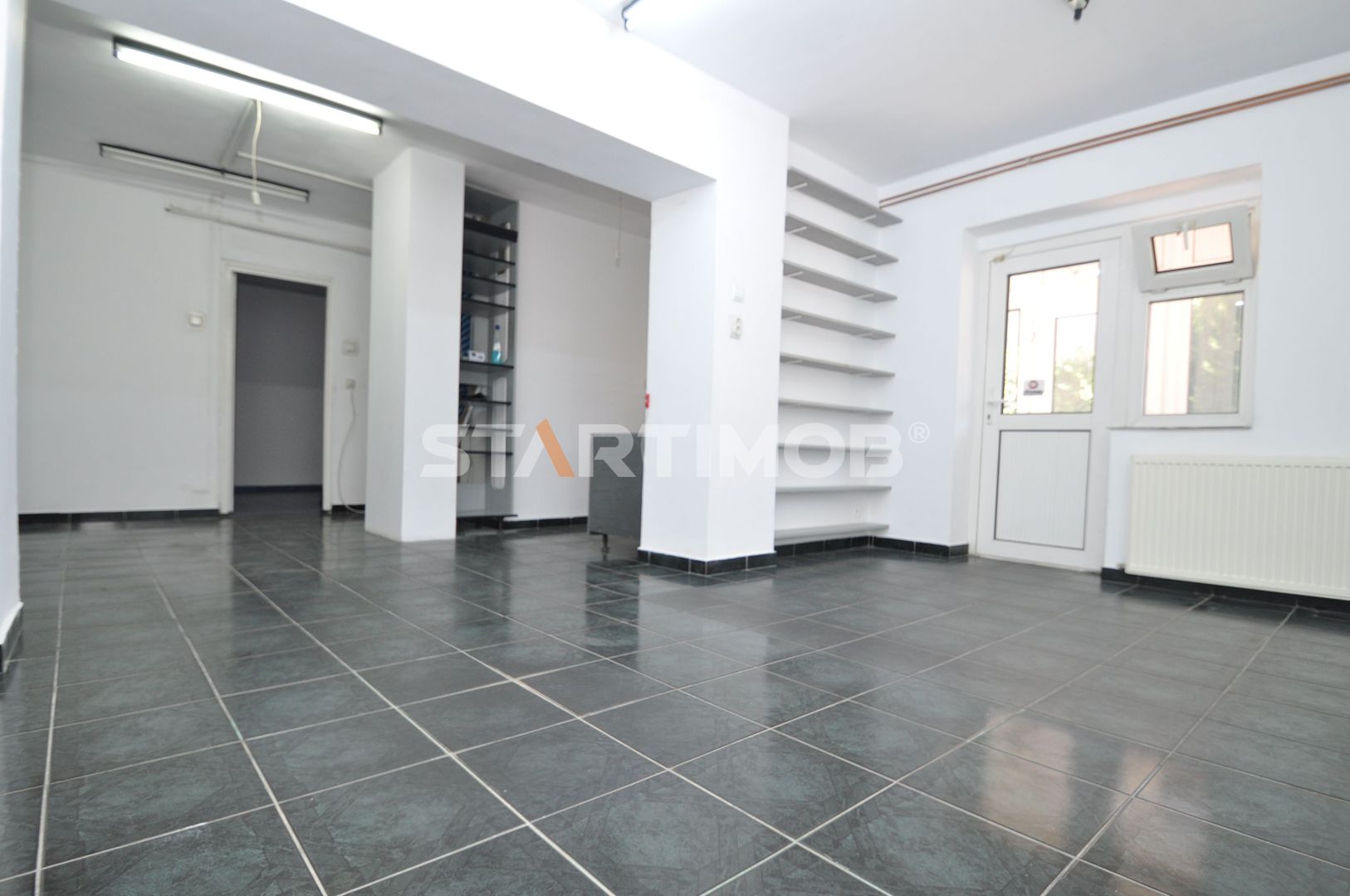 Apartament cu destinatie spatiu comercial
